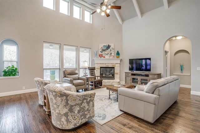 living area with a wealth of natural light and wood finished floors