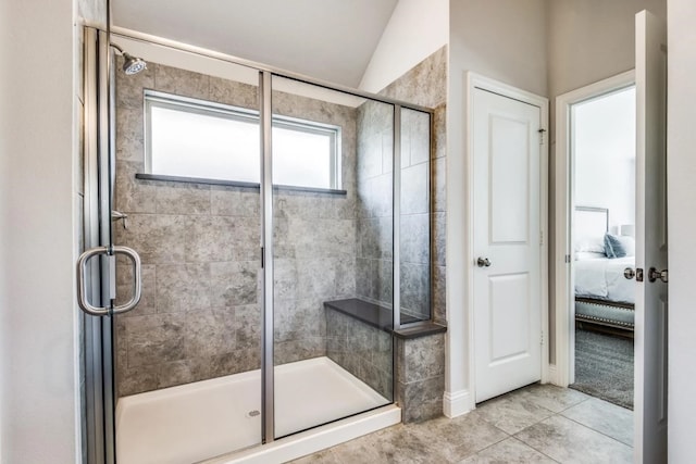 ensuite bathroom with a stall shower and ensuite bathroom