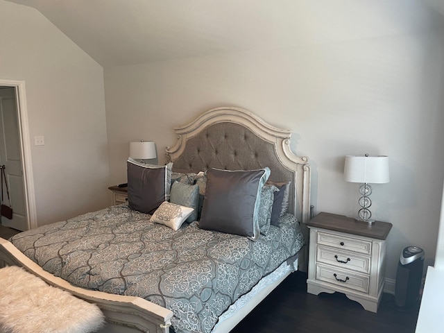 bedroom with vaulted ceiling