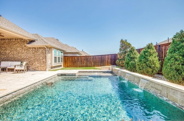 view of swimming pool featuring a patio area, a fenced backyard, and a fenced in pool