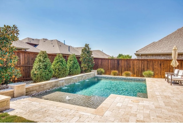 view of swimming pool with a fenced in pool, a patio, and a fenced backyard