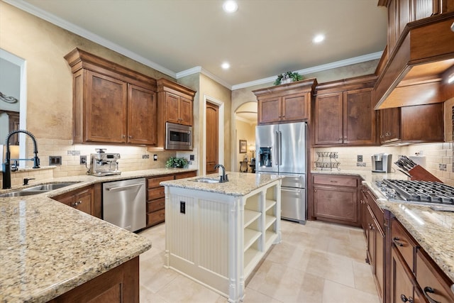 kitchen featuring a sink, open shelves, light stone countertops, and stainless steel appliances