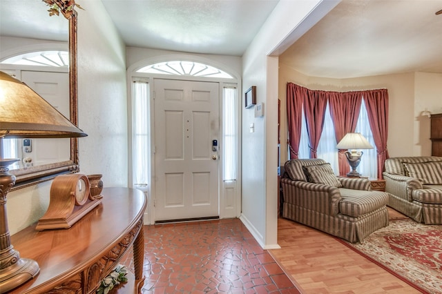 entryway featuring baseboards