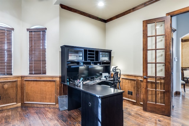 office featuring a wainscoted wall, crown molding, and wood finished floors