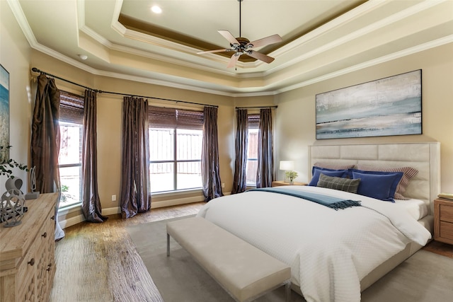 6620 Cedar Grove Dr, North Richland Hills, TX 76182 - bedroom featuring a tray ceiling, wood finished floors, baseboards, and ornamental molding