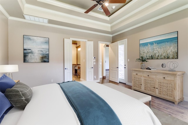 6620 Cedar Grove Dr, North Richland Hills, TX 76182 - bedroom featuring light wood finished floors, a raised ceiling, baseboards, visible vents, and ornamental molding