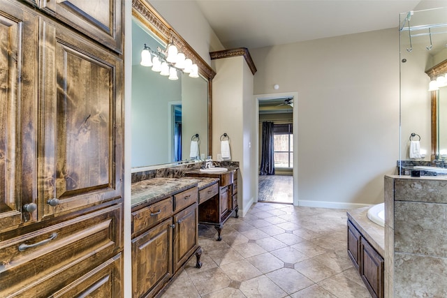 6620 Cedar Grove Dr, North Richland Hills, TX 76182 - bathroom with a bath, tile patterned floors, two vanities, a sink, and ceiling fan