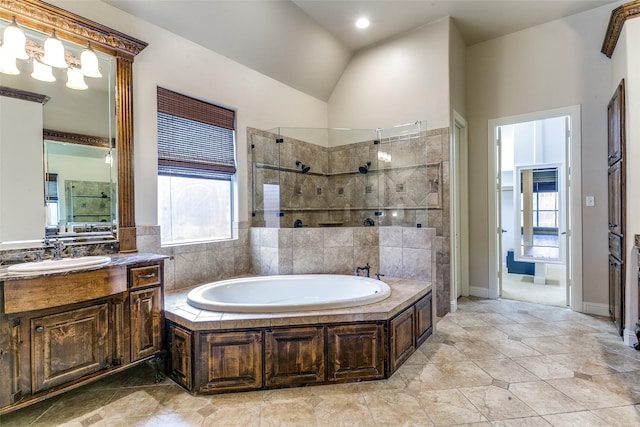6620 Cedar Grove Dr, North Richland Hills, TX 76182 - full bath with a bath, vaulted ceiling, vanity, and tiled shower