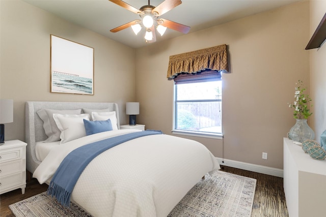 6620 Cedar Grove Dr, North Richland Hills, TX 76182 - bedroom featuring a ceiling fan, baseboards, and dark wood-type flooring