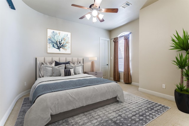 6620 Cedar Grove Dr, North Richland Hills, TX 76182 - bedroom with ceiling fan, visible vents, baseboards, and light carpet