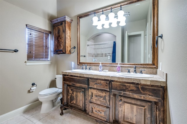 bathroom featuring a sink, toilet, walk in shower, and tile patterned floors