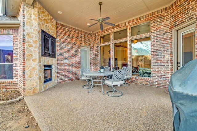 view of patio featuring outdoor dining space and ceiling fan