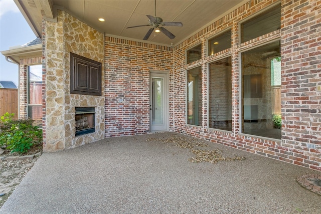 6620 Cedar Grove Dr, North Richland Hills, TX 76182 - view of patio featuring an outdoor stone fireplace and ceiling fan