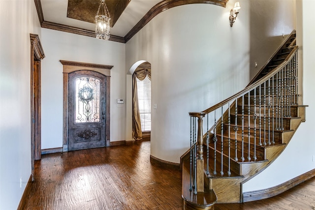 6620 Cedar Grove Dr, North Richland Hills, TX 76182 - entryway featuring stairway, wood finished floors, ornamental molding, arched walkways, and baseboards