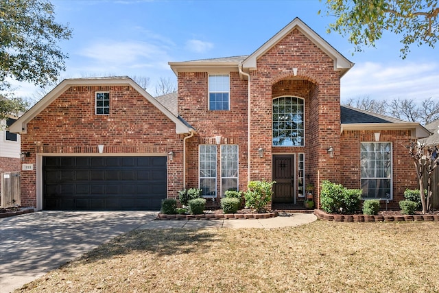 traditional-style house featuring brick siding, a front lawn, concrete driveway, and a garage