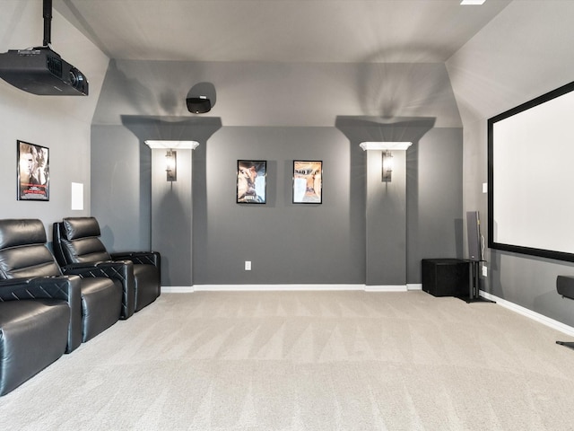 carpeted cinema featuring baseboards