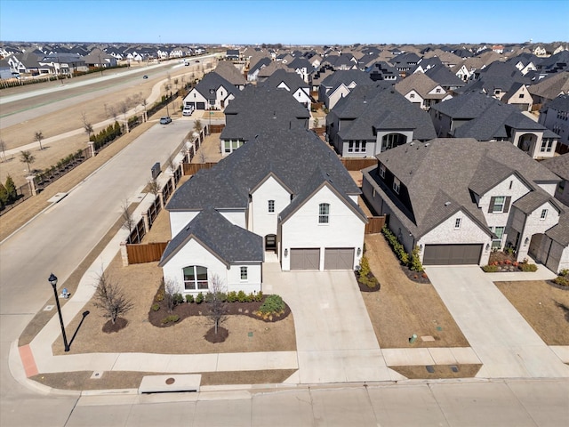 birds eye view of property with a residential view