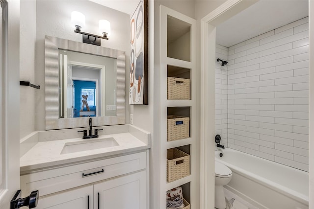 full bath with toilet,  shower combination, and vanity