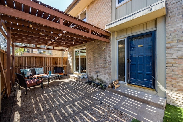 view of patio / terrace with outdoor lounge area and fence