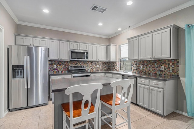 400 Goodnight Trl, Justin, TX 76247 - kitchen with visible vents, appliances with stainless steel finishes, light tile patterned floors, and dark countertops