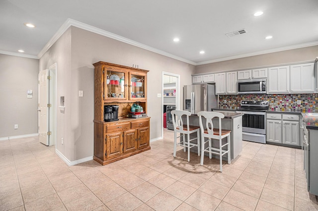400 Goodnight Trl, Justin, TX 76247 - kitchen featuring stainless steel appliances, visible vents, light tile patterned flooring, and recessed lighting