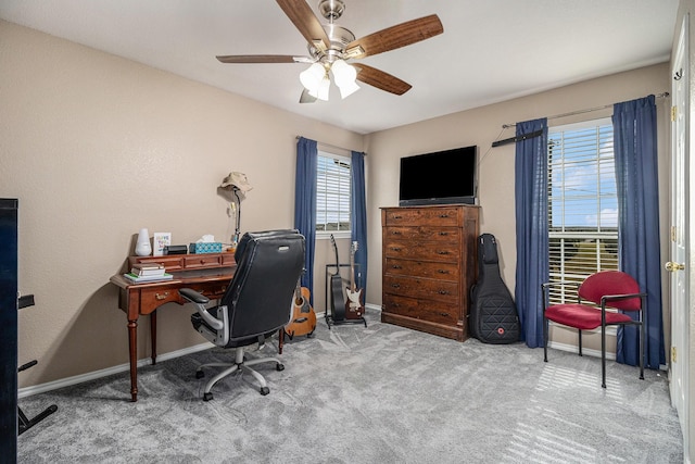 office with baseboards, ceiling fan, and carpet floors