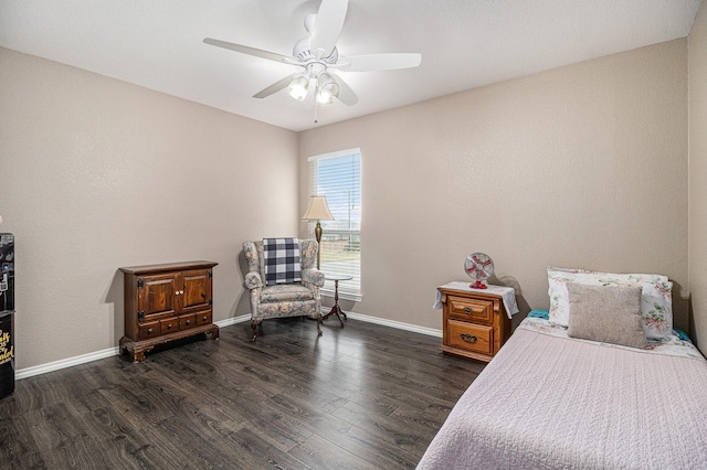 bedroom with baseboards, dark wood-style floors, and a ceiling fan