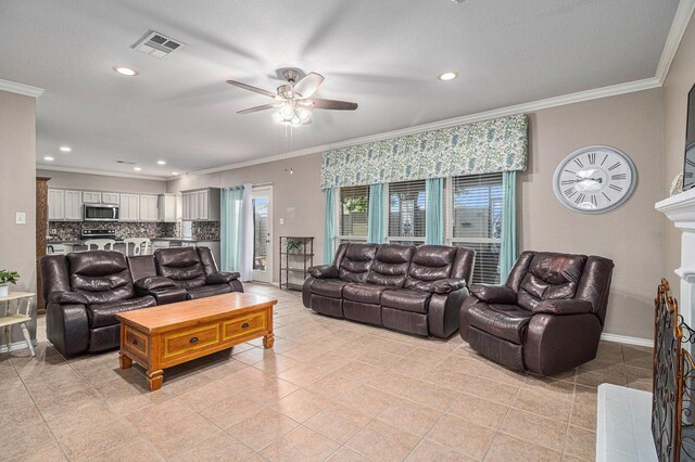 400 Goodnight Trl, Justin, TX 76247 - living area featuring crown molding, baseboards, a ceiling fan, and visible vents