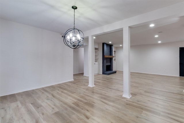 interior space with recessed lighting, baseboards, and light wood-type flooring