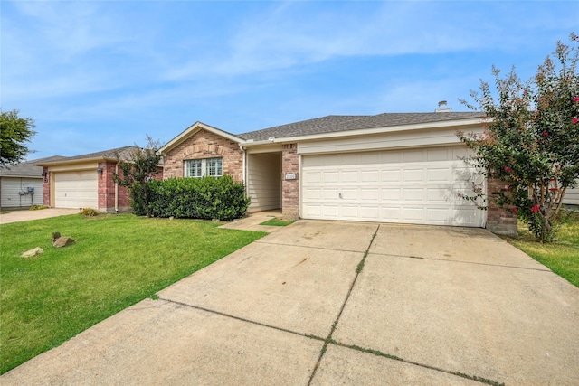 ranch-style house with a front yard, an attached garage, brick siding, and driveway