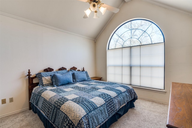 bedroom with crown molding, carpet flooring, and vaulted ceiling