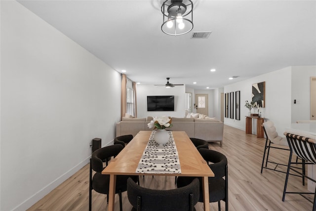 dining room with baseboards, visible vents, recessed lighting, ceiling fan, and light wood-type flooring
