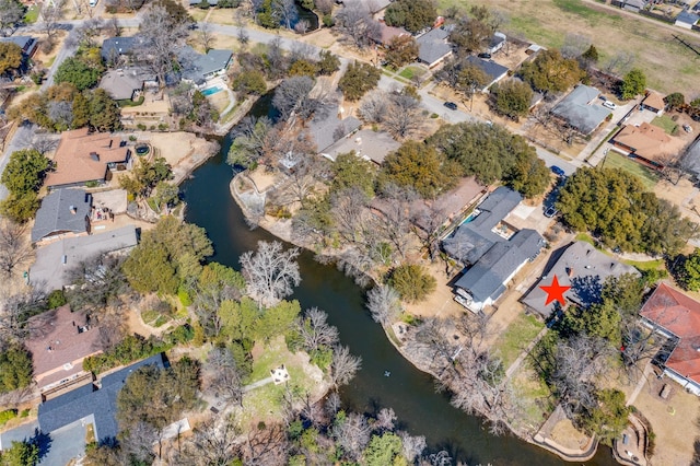 aerial view featuring a residential view and a water view