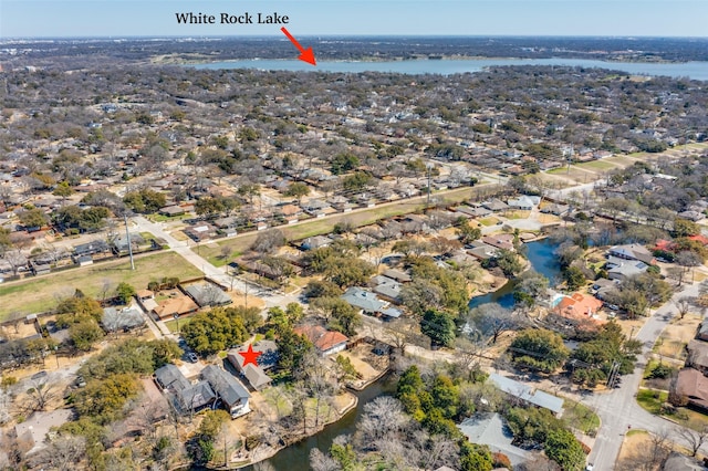 aerial view featuring a residential view and a water view