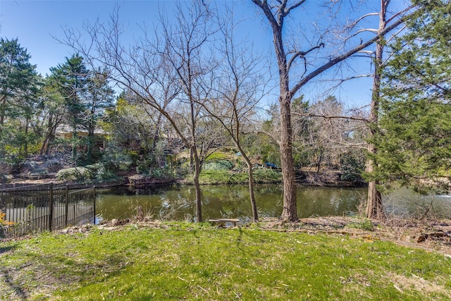 water view featuring fence