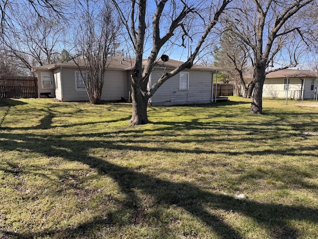 view of yard with fence