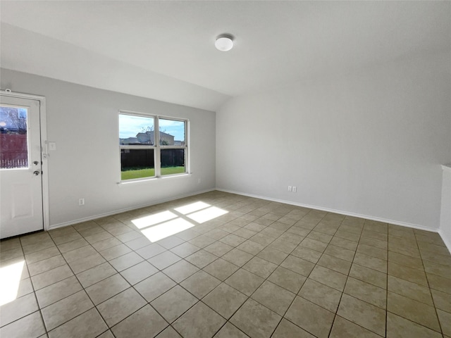 empty room featuring baseboards