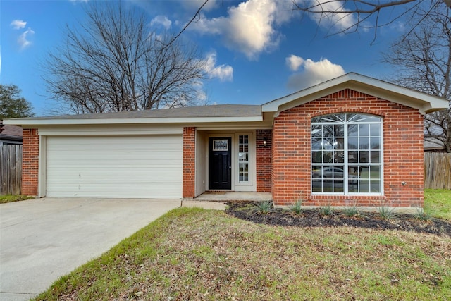 single story home featuring concrete driveway, a garage, fence, and brick siding