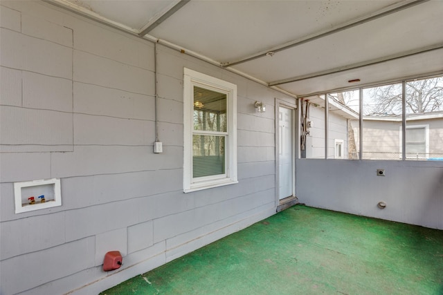 unfurnished sunroom with plenty of natural light