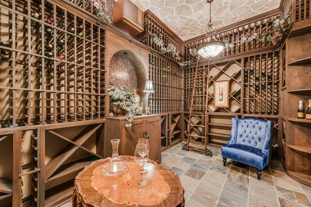 wine area with stone tile flooring