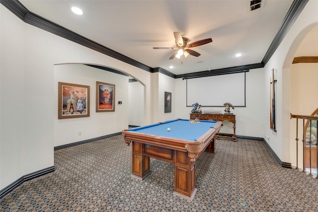 playroom with visible vents, ornamental molding, arched walkways, carpet, and baseboards