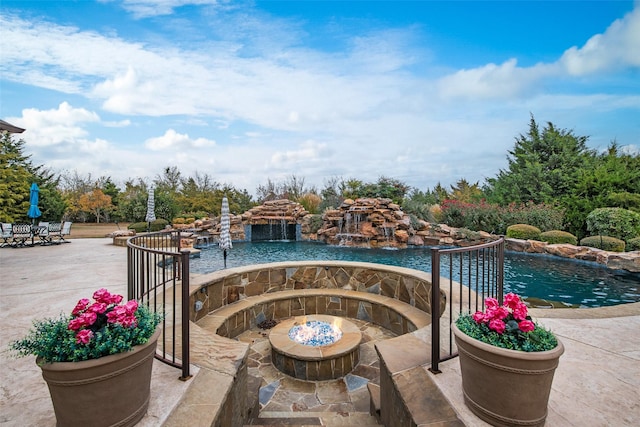 view of patio / terrace featuring a fire pit