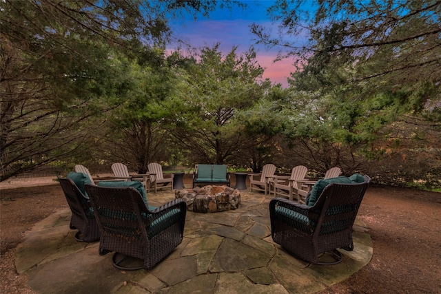 view of patio terrace at dusk