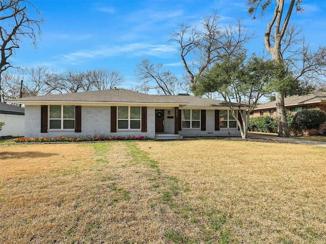 single story home featuring brick siding and a front yard