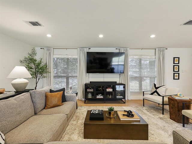 dining room with recessed lighting, visible vents, and light wood-style flooring