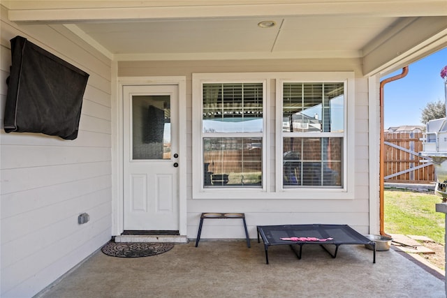 property entrance featuring fence