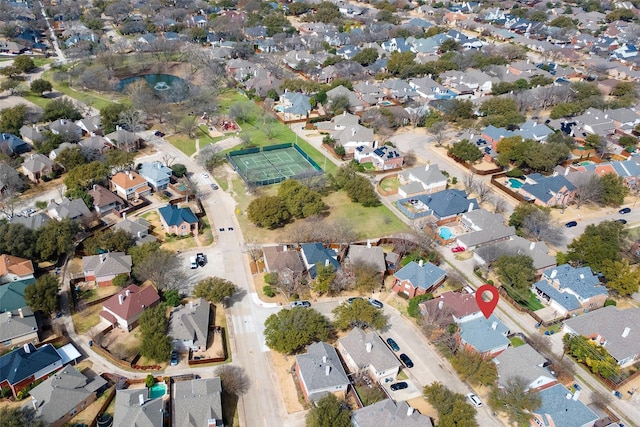 birds eye view of property with a residential view