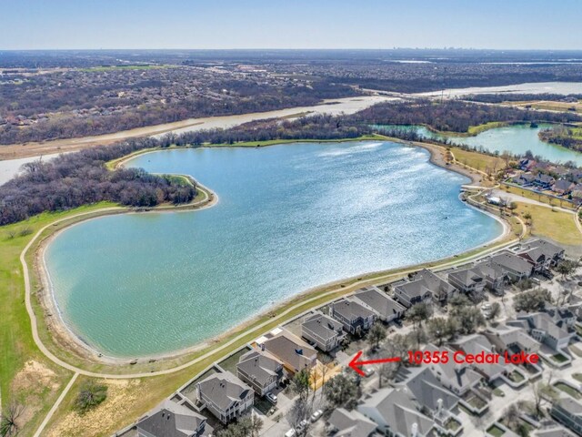 bird's eye view with a water view and a residential view