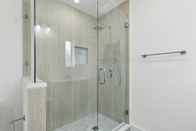 full bathroom featuring a shower stall