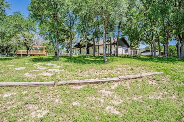 view of yard with a deck